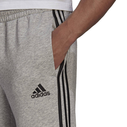 Ciemnoszare spodnie dresowe Adidas Essentials Tap Cuff 3 Stripes GK8976